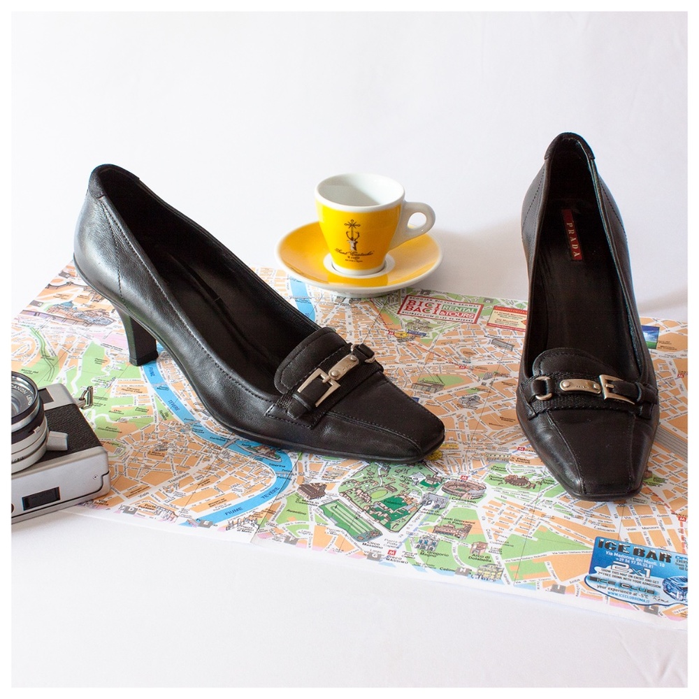 Prada black buckled pumps